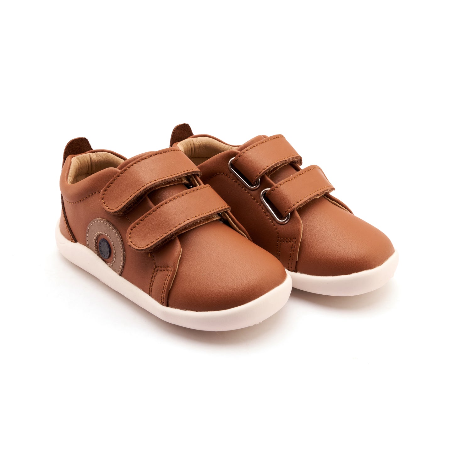 Pair of brown children's shoes on a white background